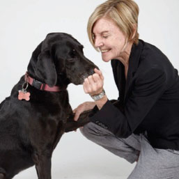 Maureen McClain  with a dog